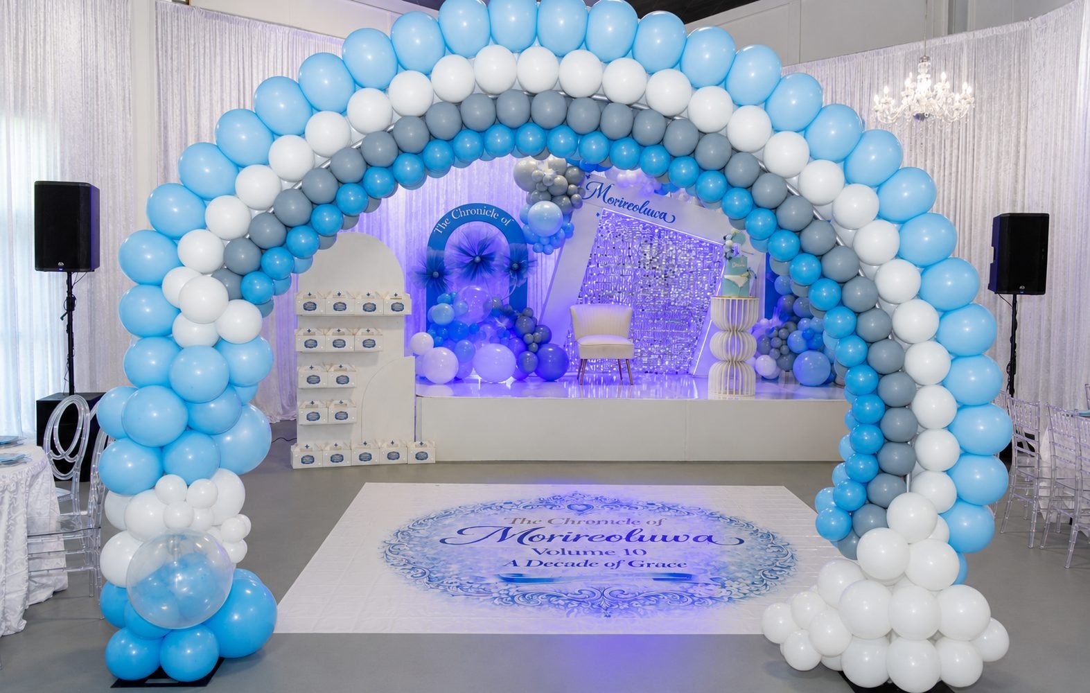 Balloon arch and decorated celebration set-up at The Hendrix banquet hall in Stafford, Houston