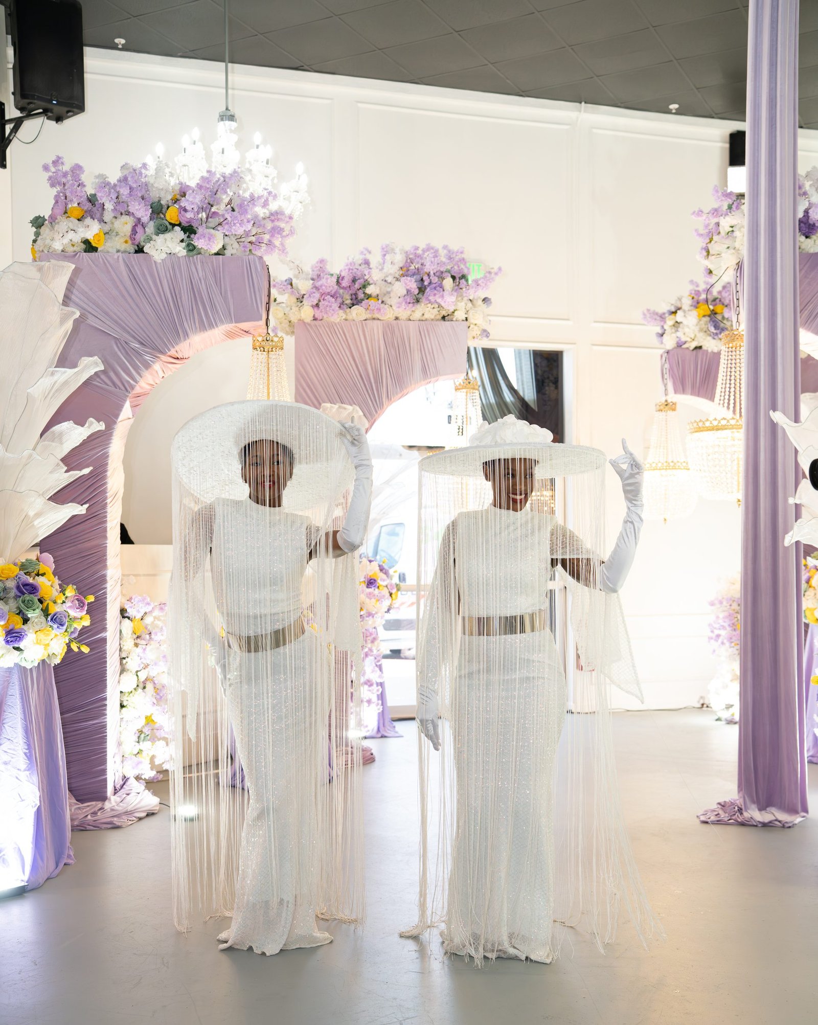 Guests in coordinated dress at a cultural celebration at The Hendrix, Houston