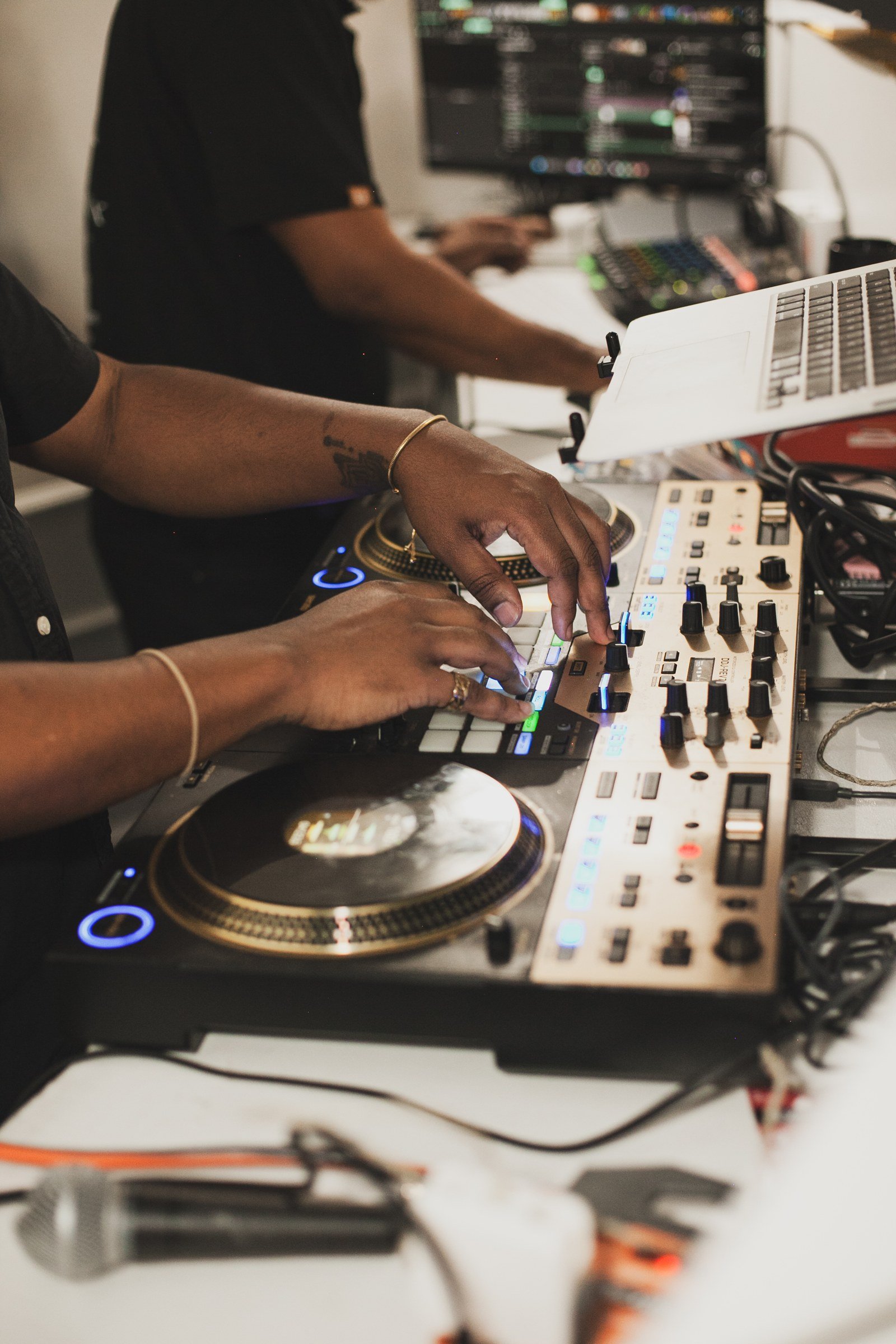 A DJ mixing at a celebration at The Hendrix, Stafford, Houston