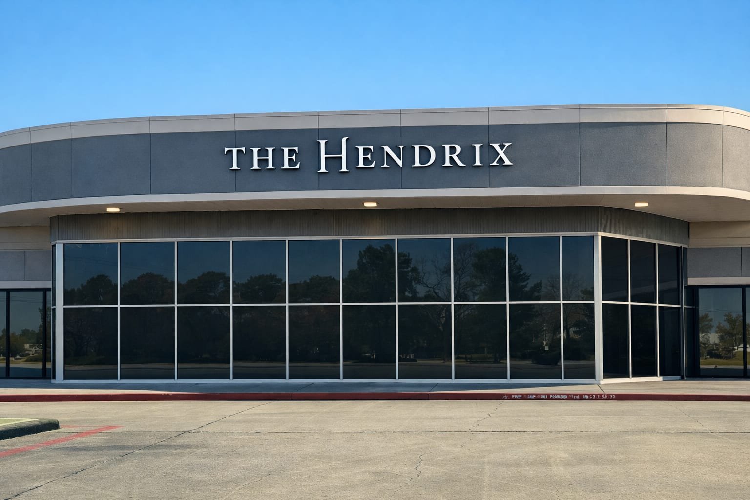The front of The Hendrix event venue on Texas Parkway in Stafford, with its lettered fascia and tall glass frontage