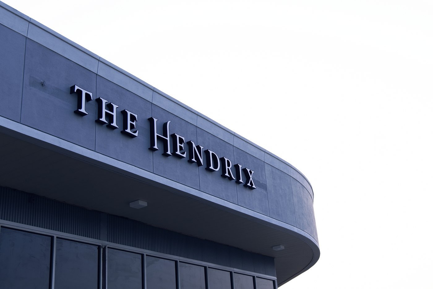 The Hendrix metal lettering on the building fascia in Stafford, Texas