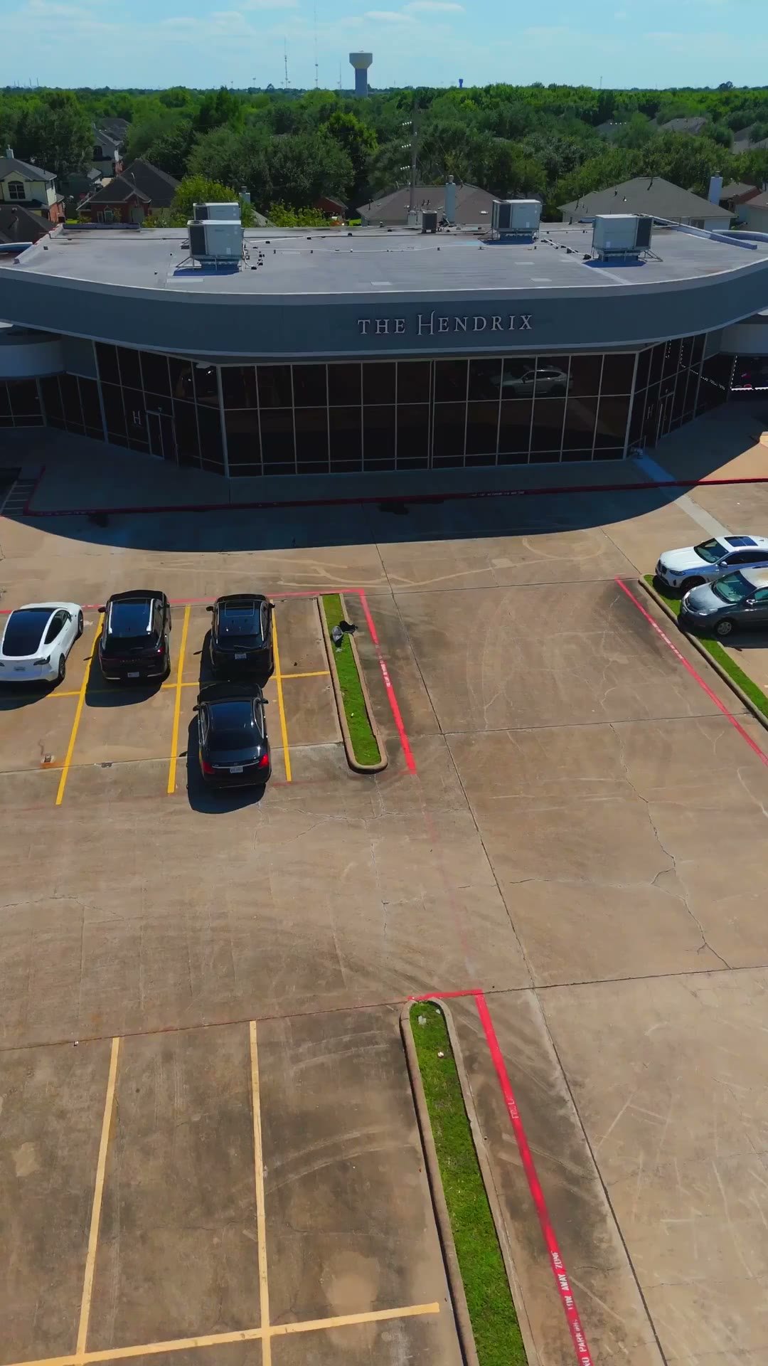 Aerial view of The Hendrix on Texas Parkway in Stafford with its free on-site car park in front of the building